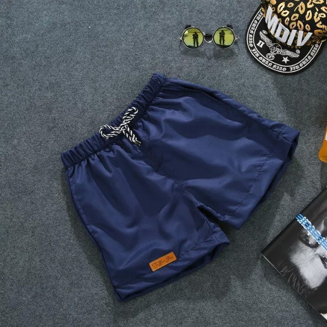 Pantalones cortos ajustados de moda para playa para hombre