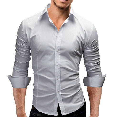 Camisa formal  de color liso, manga larga y corte entallado para hombre