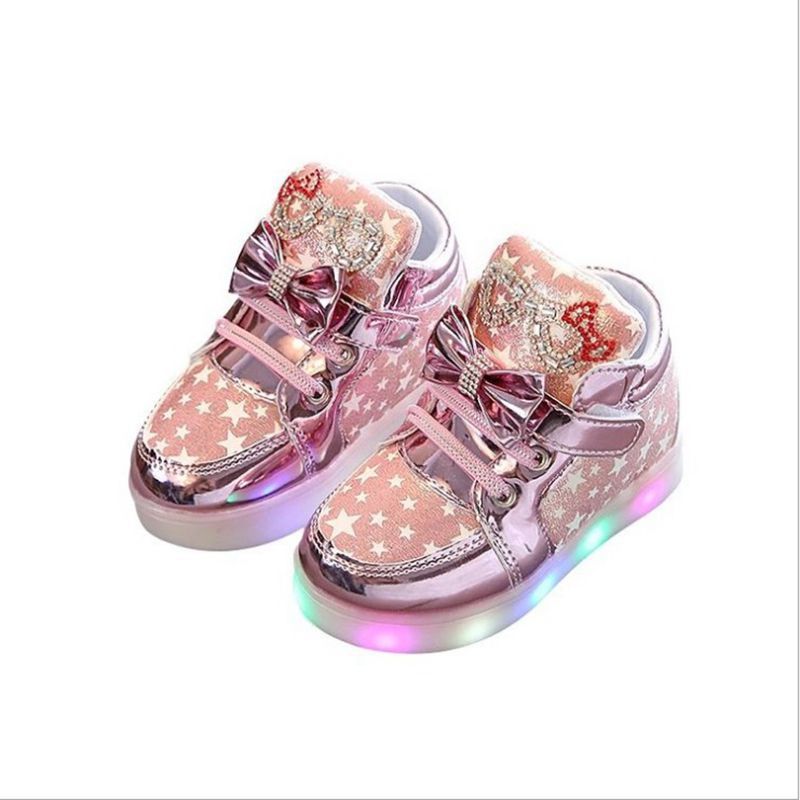 zapato LED boton magico