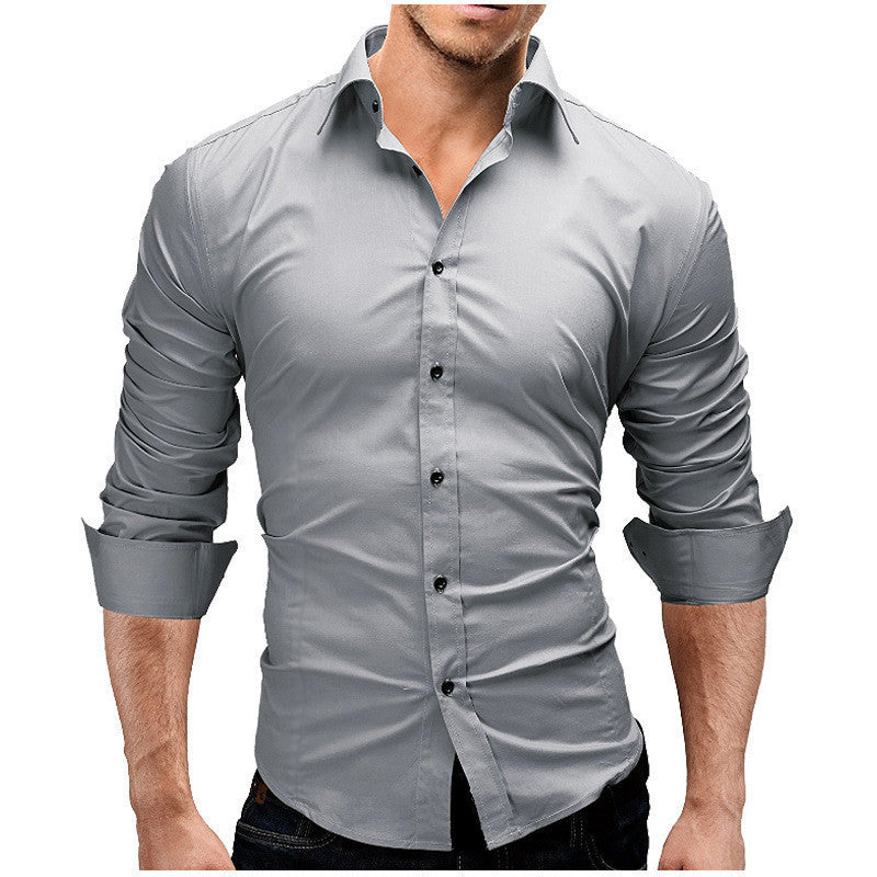 Camisa formal  de color liso, manga larga y corte entallado para hombre