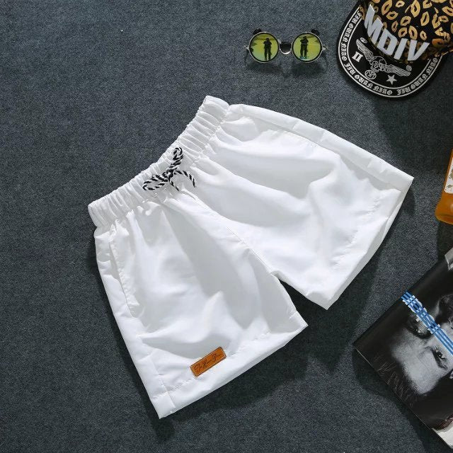 Pantalones cortos ajustados de moda para playa para hombre