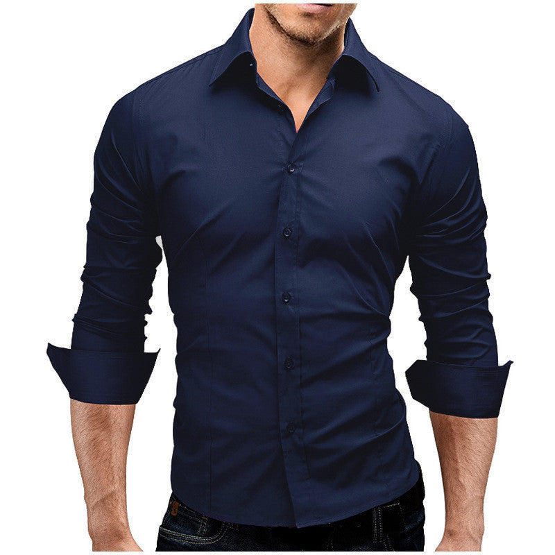 Camisa formal  de color liso, manga larga y corte entallado para hombre